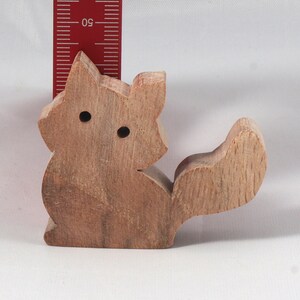 Handmade and unfinished, this stackable toy kitten cat cutout is ready to paint. This unpainted cutout is an excellent option for a fun DIY project or as a pretend toy for children. Available in several sizes, including custom orders.