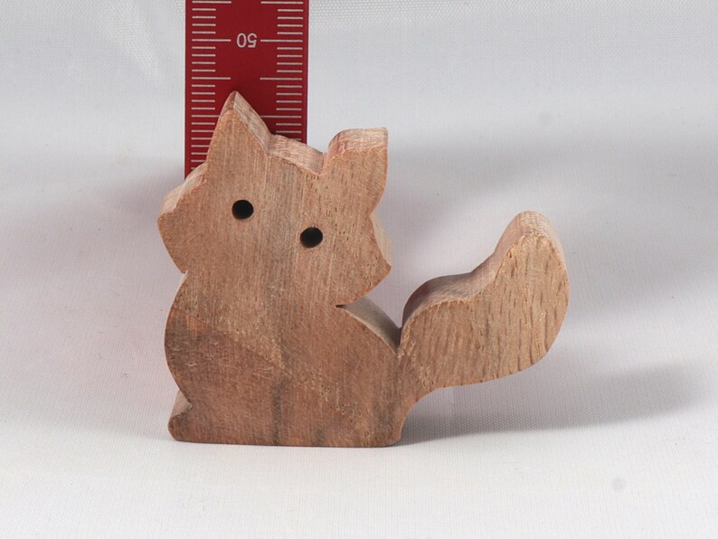 Handmade and unfinished, this stackable toy kitten cat cutout is ready to paint. This unpainted cutout is an excellent option for a fun DIY project or as a pretend toy for children. Available in several sizes, including custom orders.