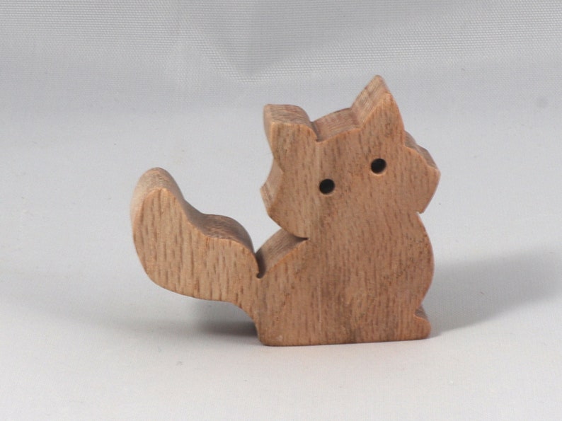 Handmade and unfinished, this stackable toy kitten cat cutout is ready to paint. This unpainted cutout is an excellent option for a fun DIY project or as a pretend toy for children. Available in several sizes, including custom orders.