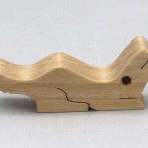Handmade Wood Alligator Family Stacking Puzzle Mom and five baby (hatchling) alligators. This freestanding puzzle is hand-finished with a custom blend of mineral oil and waxes for a beautiful, smooth, and durable finish.
