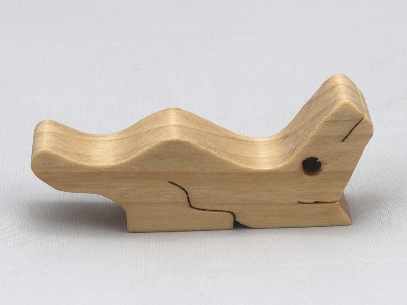Handmade Wood Alligator Family Stacking Puzzle Mom and five baby (hatchling) alligators. This freestanding puzzle is hand-finished with a custom blend of mineral oil and waxes for a beautiful, smooth, and durable finish.