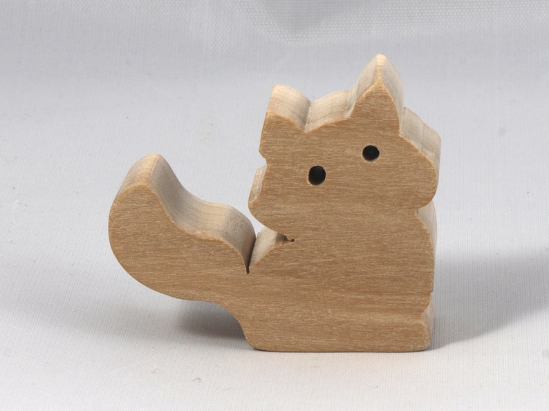 Handmade and unfinished, this stackable toy kitten cat cutout is ready to paint. This unpainted cutout is an excellent option for a fun DIY project or as a pretend toy for children. Available in several sizes, including custom orders.