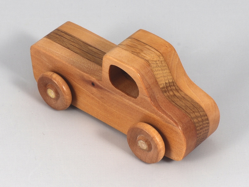 Handmade wooden toy pickup truck handmade from oak, poplar, and birch hardwoods with a satin polyurethane finish from my Play Pal Collection.