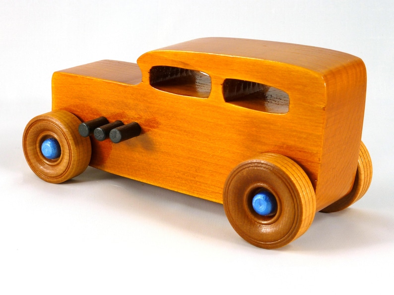 Handmade Wood Toy Car Hot Rod 1932 Sedan Finished With Amber Shellac And Trimmed With Metallic Saphire Blue And Black Acrylic Paint From My Hot Rod Collection