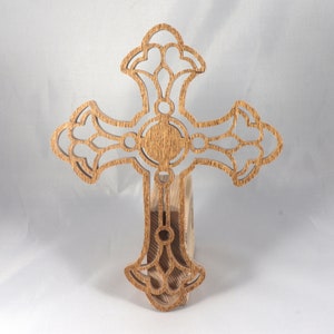 This beautiful handmade rustic fretwork cross is made from reclaimed hardwood flooring samples and adds a touch of rustic elegance to your home.