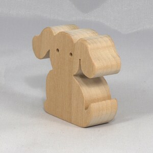 Handmade, stackable toy puppy dog cutout from the Itty Bitty Animal Collection. Unfinished and unpainted, crafted for creative play. Smoothly sanded and ready to be personalized with your favorite colors.