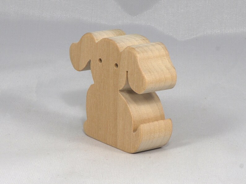 Handmade, stackable toy puppy dog cutout from the Itty Bitty Animal Collection. Unfinished and unpainted, crafted for creative play. Smoothly sanded and ready to be personalized with your favorite colors.