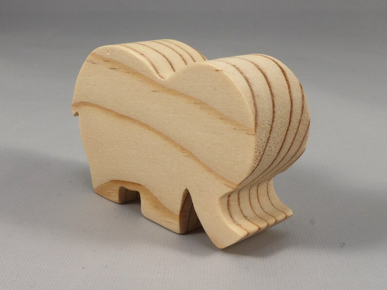Handmade wooden toy Elephant cutout from the Itty Bitty Animal Collection stackable and unfinished crafted with traditional tools in the USA. Ideal for kid's crafts or pretend play, ready to be personalized to inspire creativity and imagination.