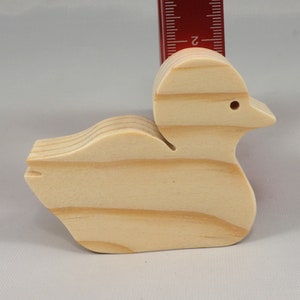 Handcrafted 2 inchwooden toy duck cutout made from 3/4-inch thick wood.