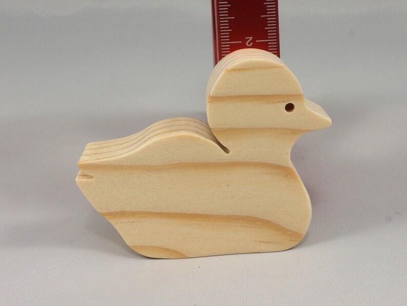 Handcrafted 2 inchwooden toy duck cutout made from 3/4-inch thick wood.