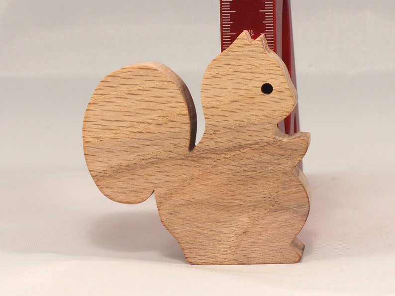 Handmade wood toy squirrel cutout is unfinished, unpainted, paintable, ready to paint, and freestanding from my Itty Bitty Animal Collection.
