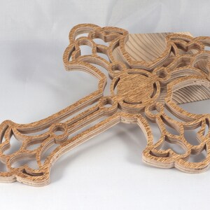 This beautiful handmade rustic fretwork cross is made from reclaimed hardwood flooring samples and adds a touch of rustic elegance to your home.