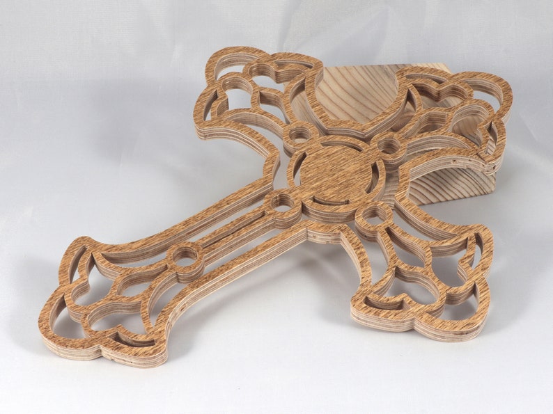 This beautiful handmade rustic fretwork cross is made from reclaimed hardwood flooring samples and adds a touch of rustic elegance to your home.