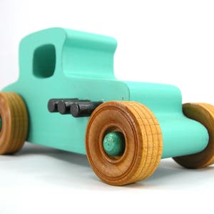 Handmade Wood Toy Car Hot Rod 1927 T-Coupe Painted with Turquoise,  Metallic Emerald Green, And Black Acrylic Paint With Wheels Finished With Nonmaring Amber Shellac Wheels