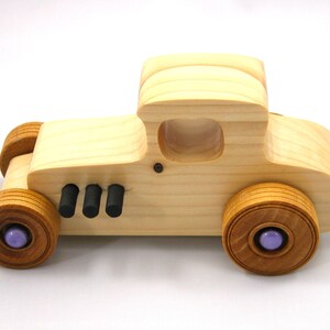 Handmade wooden toy car Hot Rod '27 T-Coupe handmade and finished with nontoxic amber shellac with metallic purple and black trim. From my Hot Rod Collection.