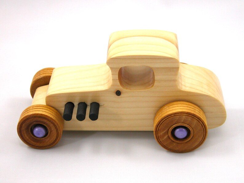 Handmade wooden toy car Hot Rod '27 T-Coupe handmade and finished with nontoxic amber shellac with metallic purple and black trim. From my Hot Rod Collection.