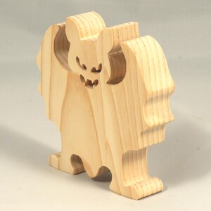 Handmade unpainted wooden Halloween bat cutout, freestanding light-colored solid wood figure with spooky carved face and outstretched wings, ready to paint, from my Snazzy Spooks collection.