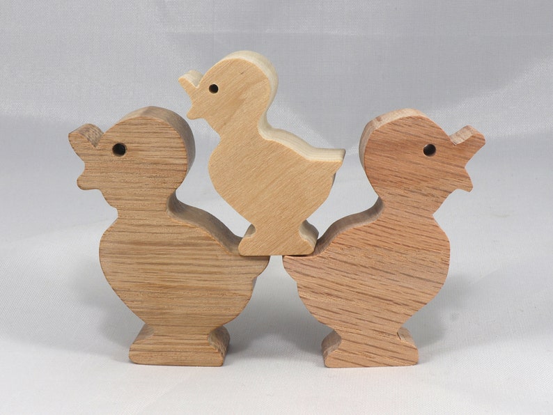 Wooden duck cutout, handmade, unfinished, and unpainted, from the Itty Bitty Animal Collection. Natural wood, freestanding, stackable, and paintable. Suitable for crafts or toys, American-made
