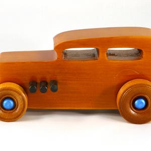 Handmade Wood Toy Car Hot Rod 1932 Sedan Finished With Amber Shellac And Trimmed With Metallic Saphire Blue And Black Acrylic Paint From My Hot Rod Collection