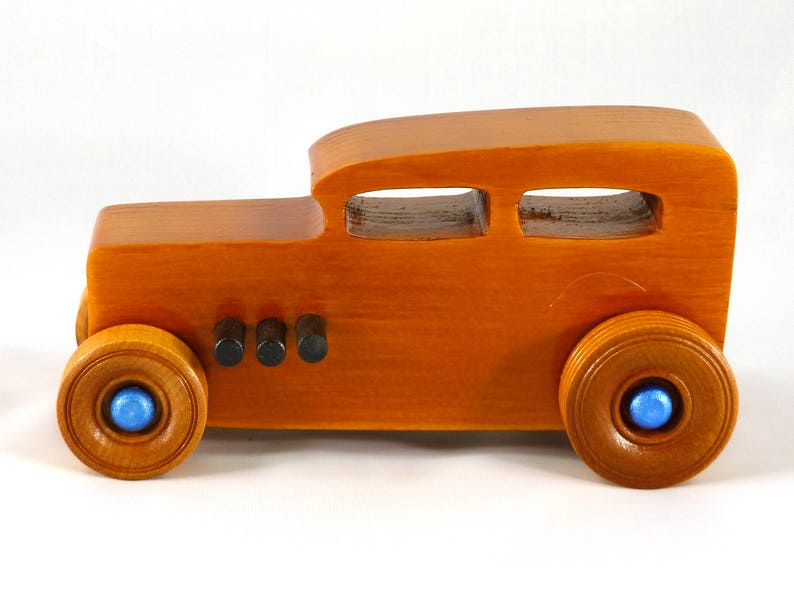 Handmade Wood Toy Car Hot Rod 1932 Sedan Finished With Amber Shellac And Trimmed With Metallic Saphire Blue And Black Acrylic Paint From My Hot Rod Collection