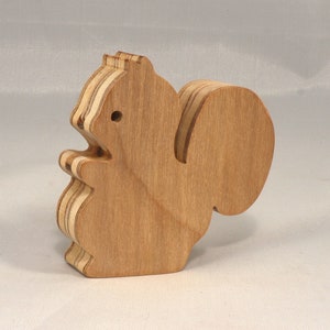 Handmade wood toy squirrel cutout is unfinished, unpainted, paintable, ready to paint, and freestanding from my Itty Bitty Animal Collection.