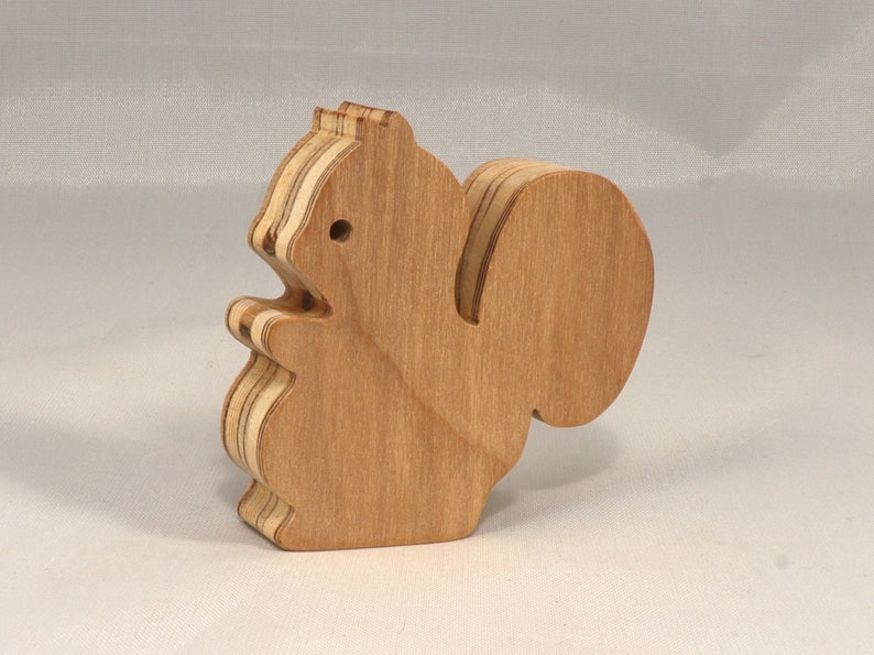 Handmade wood toy squirrel cutout is unfinished, unpainted, paintable, ready to paint, and freestanding from my Itty Bitty Animal Collection.
