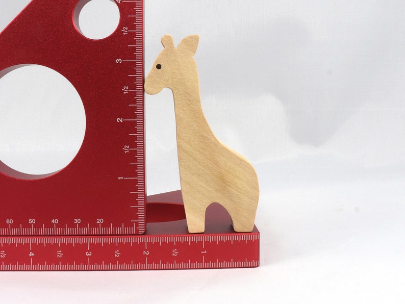 Handmade wooden giraffe cutout, unfinished, ready to paint, and freestanding. Perfect for a young child's imaginative play, stacking, or crafting.