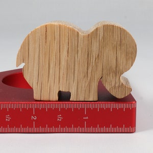 Handmade wooden toy Elephant cutout from the Itty Bitty Animal Collection stackable and unfinished crafted with traditional tools in the USA. Ideal for kid's crafts or pretend play, ready to be personalized to inspire creativity and imagination.