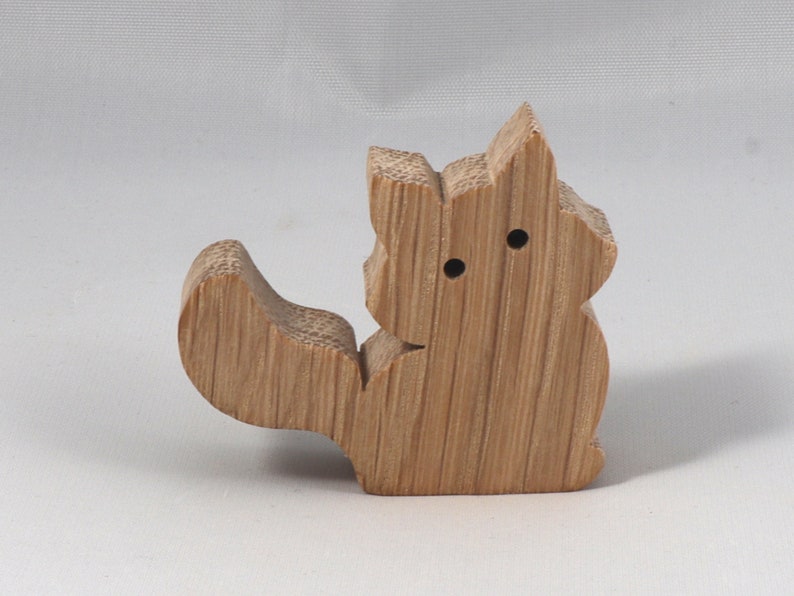 Handmade and unfinished, this stackable toy kitten cat cutout is ready to paint. This unpainted cutout is an excellent option for a fun DIY project or as a pretend toy for children. Available in several sizes, including custom orders.