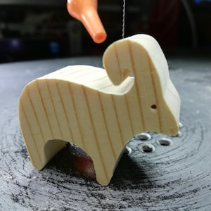 This is an unfinished wooden Ram cutout from solid wood using traditional woodworking techniques. Sanded smooth and ready to paint, stain, or customize. Freestanding design for small hands, toddlers, young children, crafters, collectors, and display. I take custom orders for any animal, quantity, and mix — including large ornament orders. Mix and match, request a different size, or send a drawing or pattern. Handmade by Odin's Toy Factory in Tallahassee, Florida, USA.