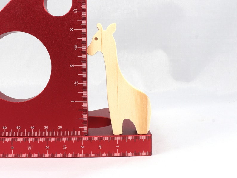 Handmade wooden giraffe cutout, unfinished, ready to paint, and freestanding. Perfect for a young child's imaginative play, stacking, or crafting.