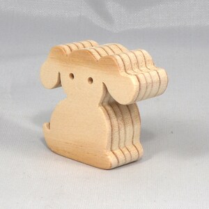 Handmade, stackable toy puppy dog cutout from the Itty Bitty Animal Collection. Unfinished and unpainted, crafted for creative play. Smoothly sanded and ready to be personalized with your favorite colors.