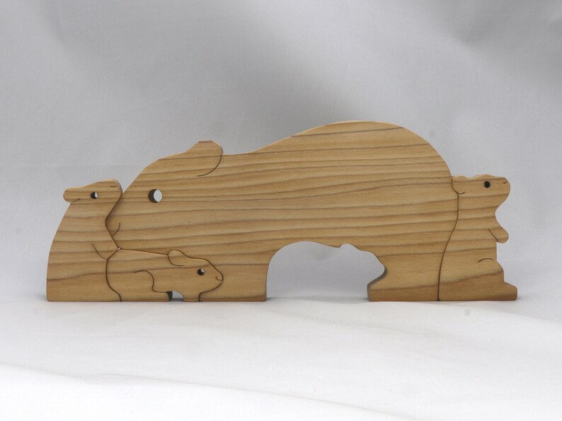 Handmade Wooden Stacking Puzzle Guinea Pig Family, Mom, and Babies finished with a non-toxic custom blend of mineral oil and waxes. This wooden toy animal is perfect for imaginative play and an excellent gift for children.