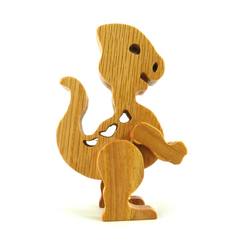 Wooden baby dinosaur figurine from My Buddies Dinos collection. Handmade with select grade hardwoods and finished with mineral oil and beeswax.