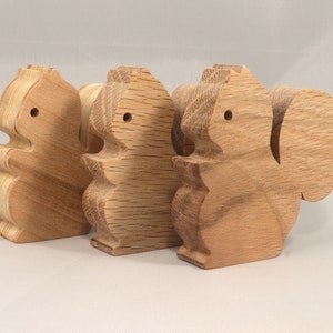 Handmade wood toy squirrel cutout is unfinished, unpainted, paintable, ready to paint, and freestanding from my Itty Bitty Animal Collection.