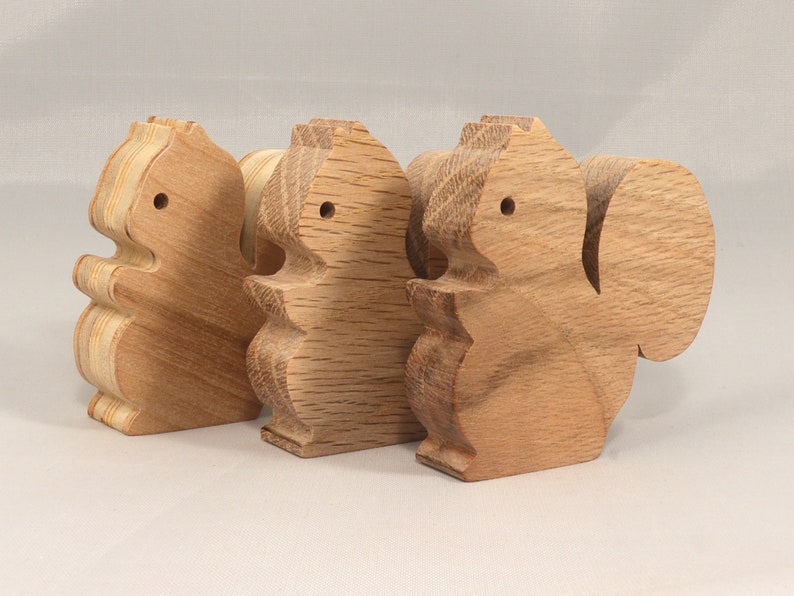 Handmade wood toy squirrel cutout is unfinished, unpainted, paintable, ready to paint, and freestanding from my Itty Bitty Animal Collection.