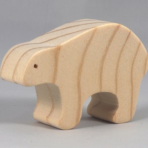 This is an unfinished wooden bear cutout from solid wood using traditional woodworking techniques. Sanded smooth and ready to paint, stain, or customize. Freestanding design for small hands, toddlers, young children, crafters, collectors, and display. I take custom orders for any animal, quantity, and mix — including large ornament orders. Mix and match, request a different size, or send a drawing or pattern. Handmade by Odin's Toy Factory in Tallahassee, Florida, USA.