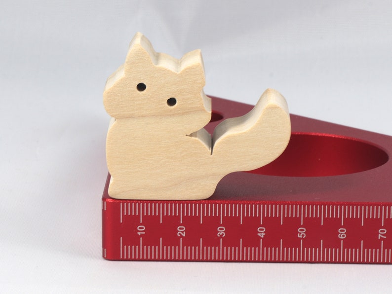 Handmade and unfinished, this stackable toy kitten cat cutout is ready to paint. This unpainted cutout is an excellent option for a fun DIY project or as a pretend toy for children. Available in several sizes, including custom orders.