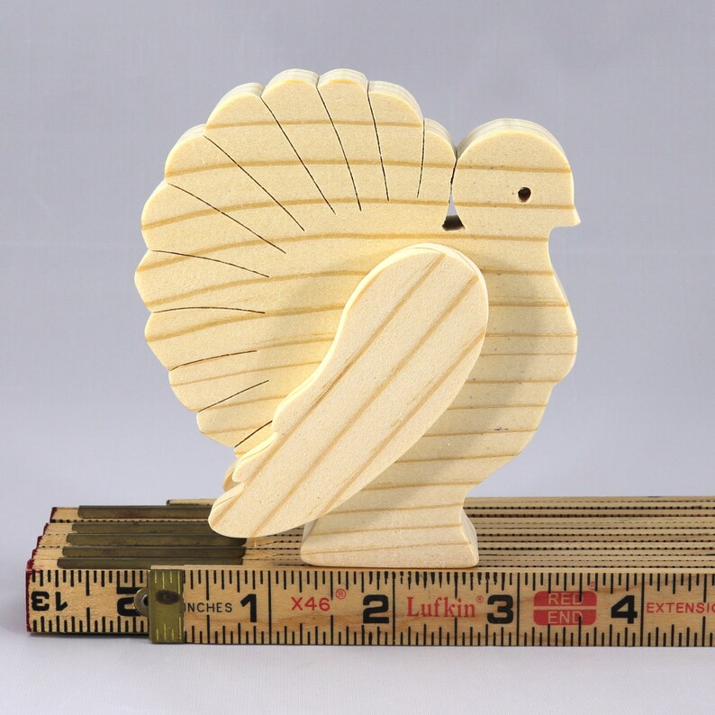 Handmade 3D layered freestanding wooden turkey figurine, unfinished and unpainted. Perfect for Thanksgiving decor, crafts, or as a toy.