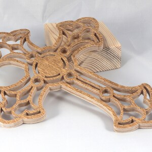 This beautiful handmade rustic fretwork cross is made from reclaimed hardwood flooring samples and adds a touch of rustic elegance to your home.