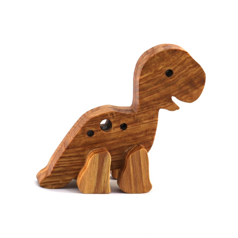 Handmade wooden baby dinosaur figurine finished with a custom blend of mineral oil and beeswax from my Buddy's Dinos Collection.