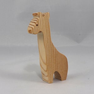 Handmade wooden giraffe cutout, unfinished, ready to paint, and freestanding. Perfect for a young child's imaginative play, stacking, or crafting.