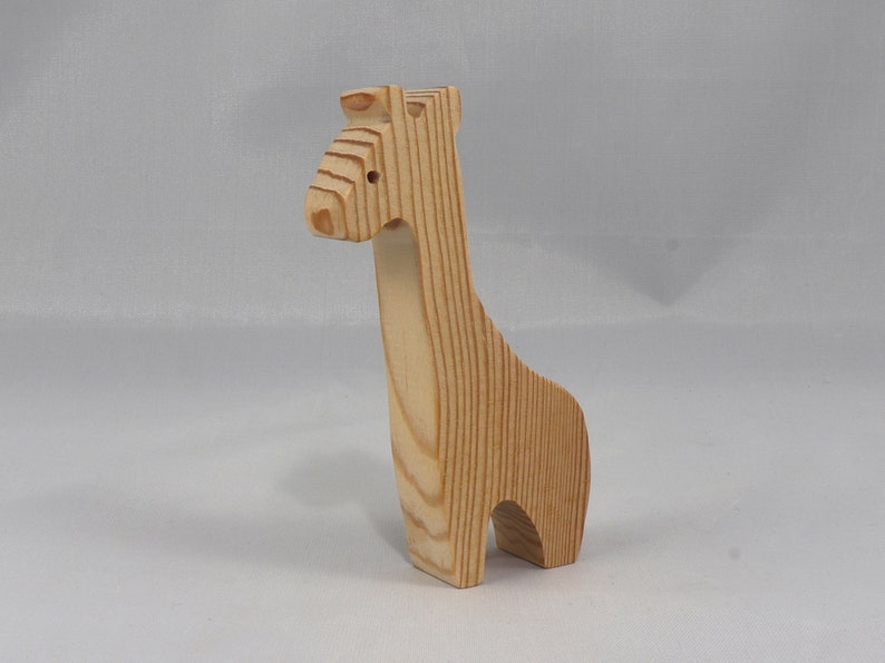Handmade wooden giraffe cutout, unfinished, ready to paint, and freestanding. Perfect for a young child's imaginative play, stacking, or crafting.