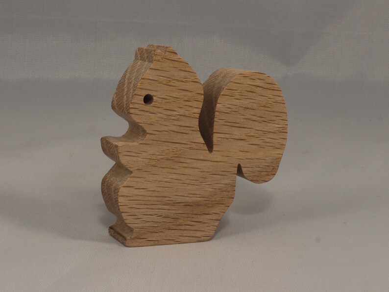 Handmade wood toy squirrel cutout is unfinished, unpainted, paintable, ready to paint, and freestanding from my Itty Bitty Animal Collection.