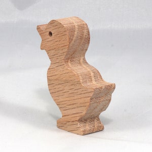 Wooden duck cutout, handmade, unfinished, and unpainted, from the Itty Bitty Animal Collection. Natural wood, freestanding, stackable, and paintable. Suitable for crafts or toys, American-made