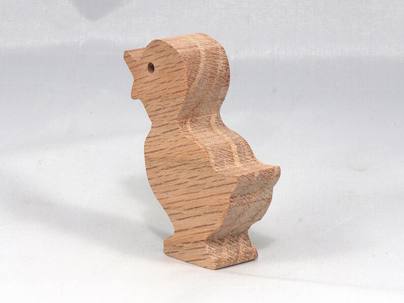 Wooden duck cutout, handmade, unfinished, and unpainted, from the Itty Bitty Animal Collection. Natural wood, freestanding, stackable, and paintable. Suitable for crafts or toys, American-made