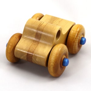 Handmade wooden toy pickup truck with a durable satin polyurethane finish and metallic sapphire blue trim from My Play Pal collection.