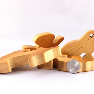A wooden four piece puzzle in the shape of a rabbit. Perfect toddlers first puzzle.