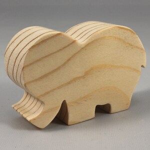 Handmade wooden toy Elephant cutout from the Itty Bitty Animal Collection stackable and unfinished crafted with traditional tools in the USA. Ideal for kid's crafts or pretend play, ready to be personalized to inspire creativity and imagination.