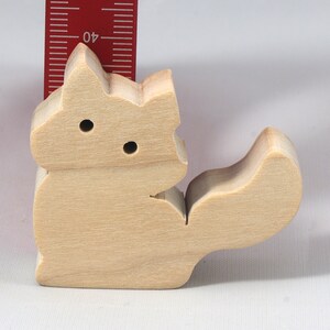 Handmade and unfinished, this stackable toy kitten cat cutout is ready to paint. This unpainted cutout is an excellent option for a fun DIY project or as a pretend toy for children. Available in several sizes, including custom orders.